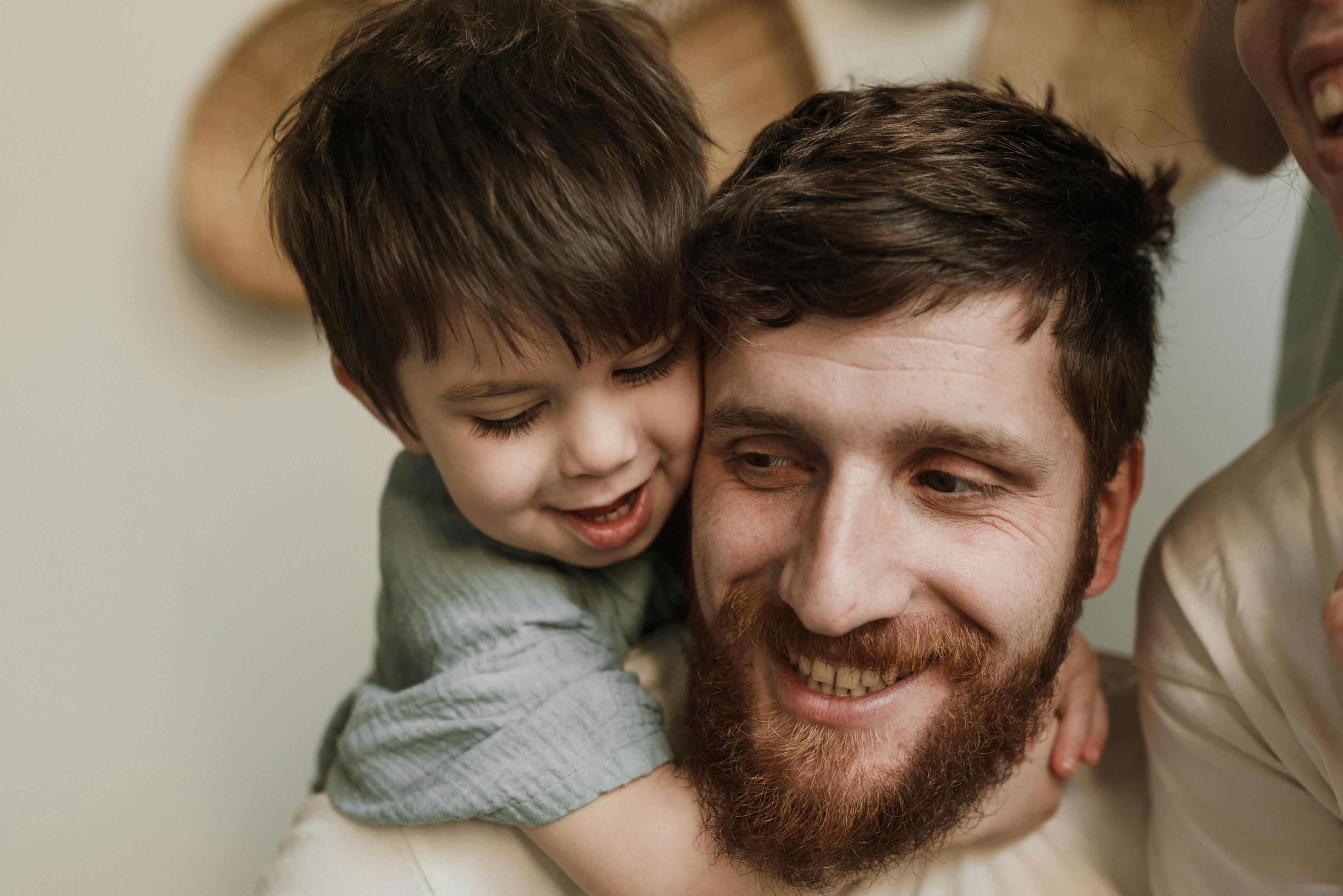 Smiling father son